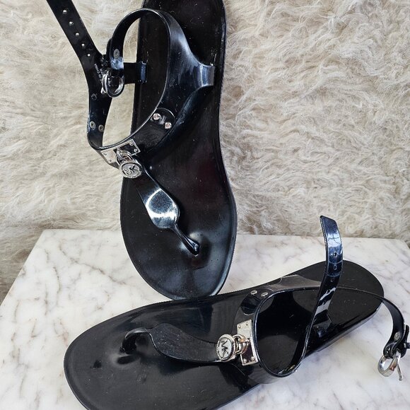 Michael Kors Women's Black Plate Jelly Flat Ankle Buckle Up Thong Sandals 7M - Picture 1 of 7